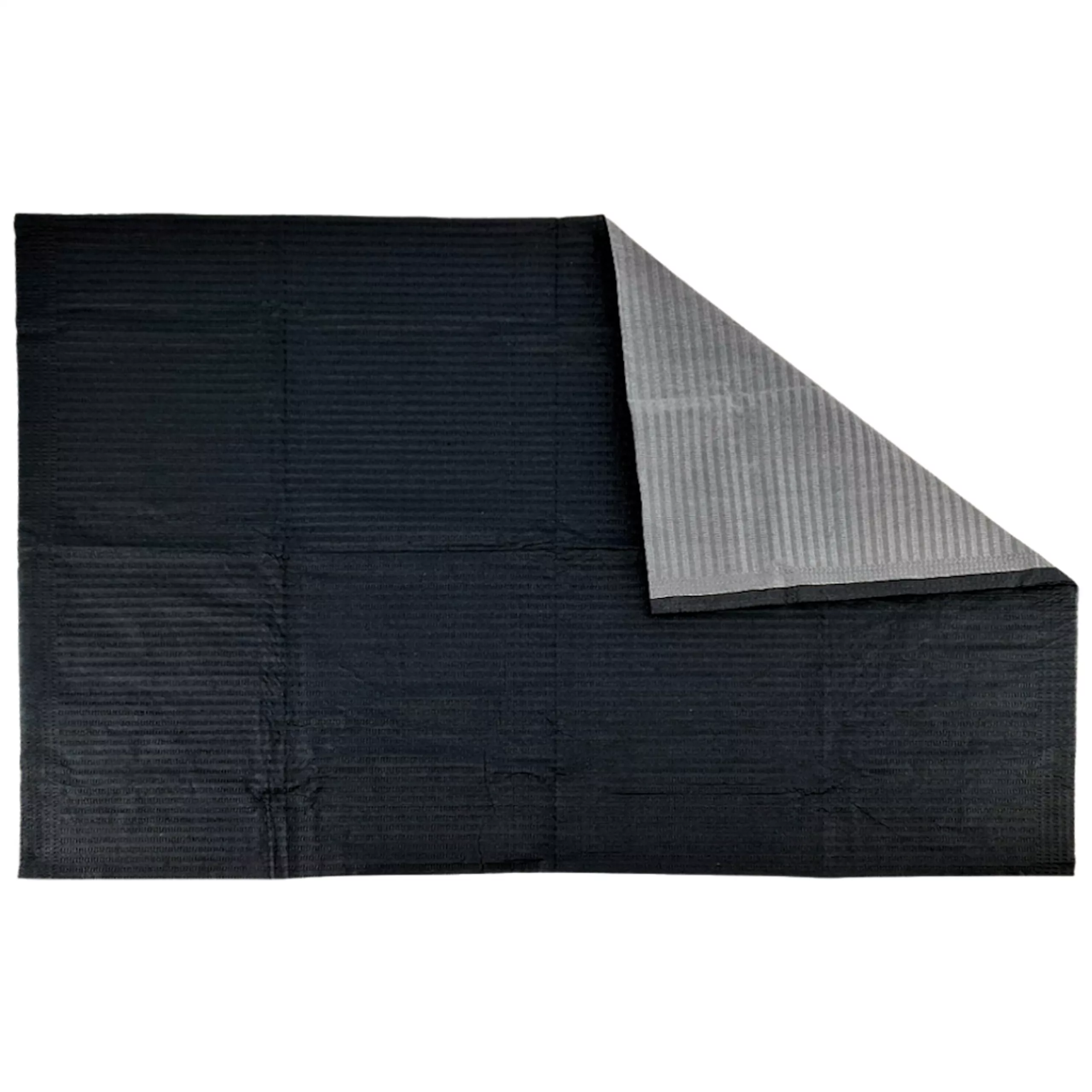 Schwarze Arbeitsplatzunterlage mit grauer Rückseite auf weißem Hintergrund