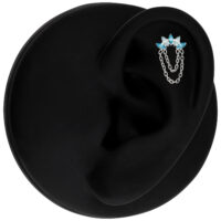 Silberner Push Fit Aufsatz mit Lavendel und Türkis Kristallen auf schwarzem Hintergrund