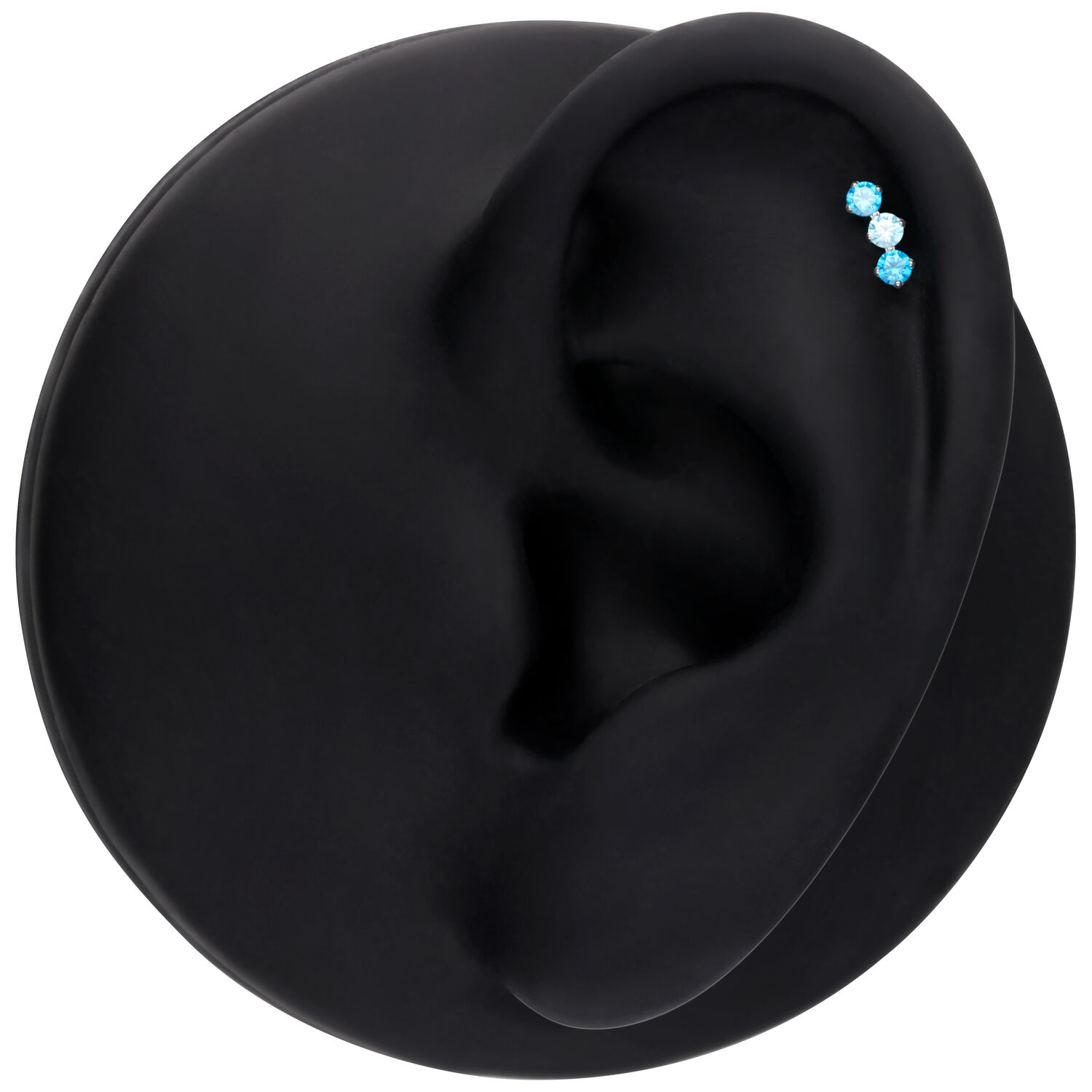 Silberner Push Fit Aufsatz mit drei funkelnden Kristallen in Lavendel und Türkis auf schwarzem Ohrmodell