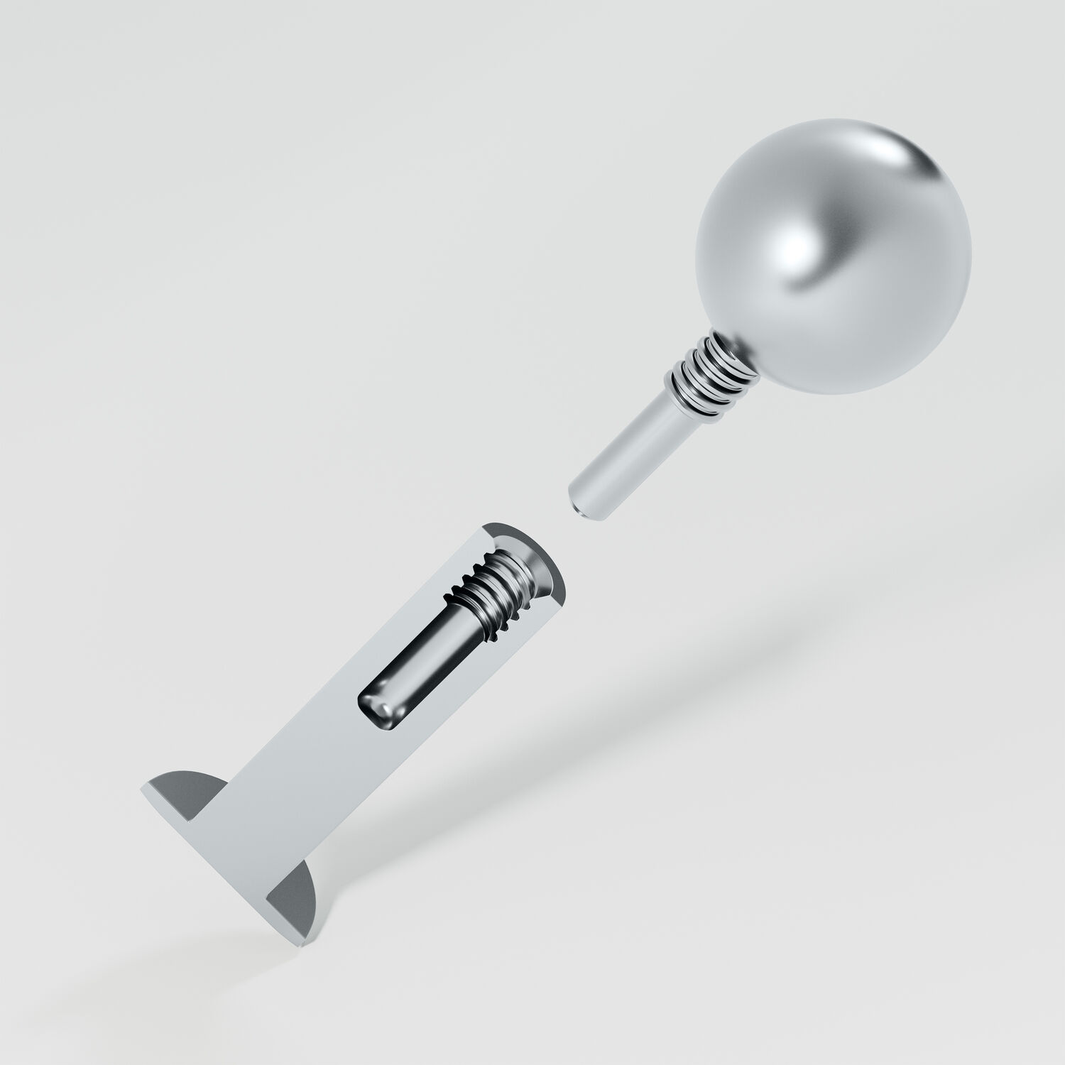 Silbernes Titan-Labret mit Innengewinde auf grauem Hintergrund