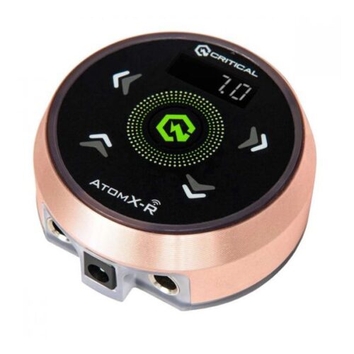 Rundes Atomxr Netzteil in Roségold mit schwarzer Oberfläche und Display