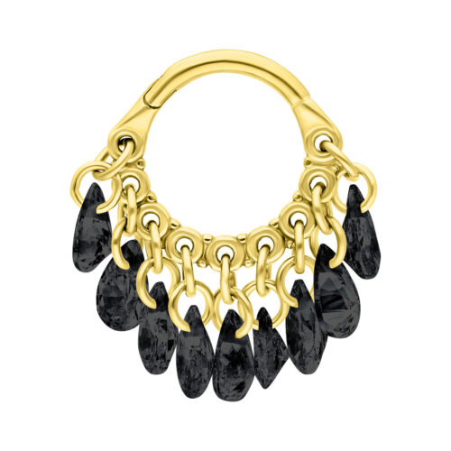 Goldener Clicker mit hängenden schwarzen Kristallen vor weißem Hintergrund