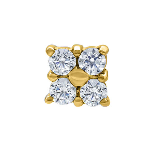 Goldener Piercingaufsatz mit vier klaren Kristallen auf weißem Hintergrund