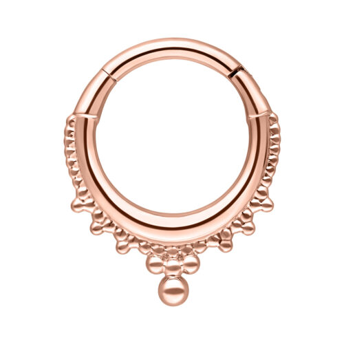 Roségoldener Piercingring mit dekorativen Kugeln auf weißem Hintergrund