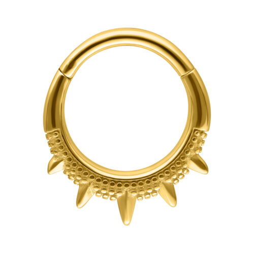Goldener Septum Clicker mit orientalischen Spitzen auf weißem Hintergrund