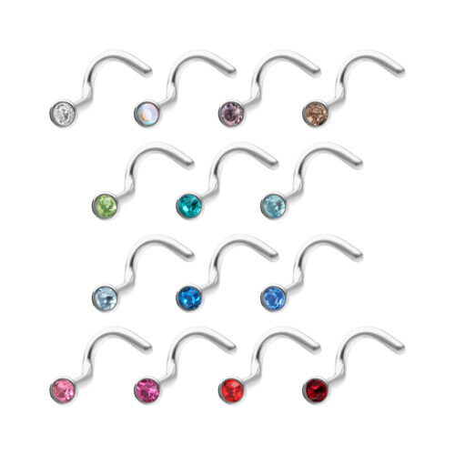 Verschiedene Nasenstecker aus Titan mit bunten Kristallen auf weißem Hintergrund